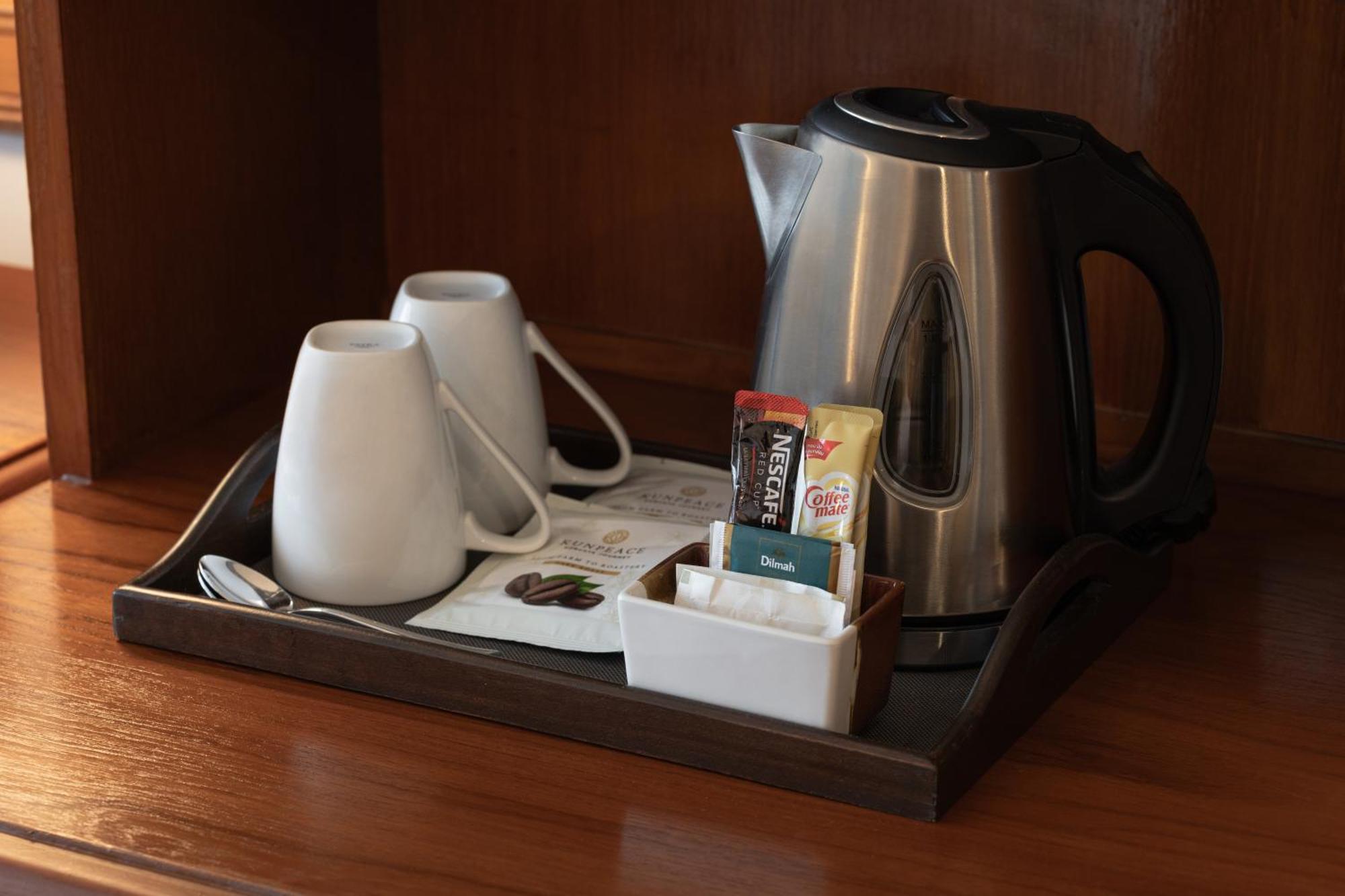 Royal Phuket City Hotel Εξωτερικό φωτογραφία A kettle with a selection of tea and coffee