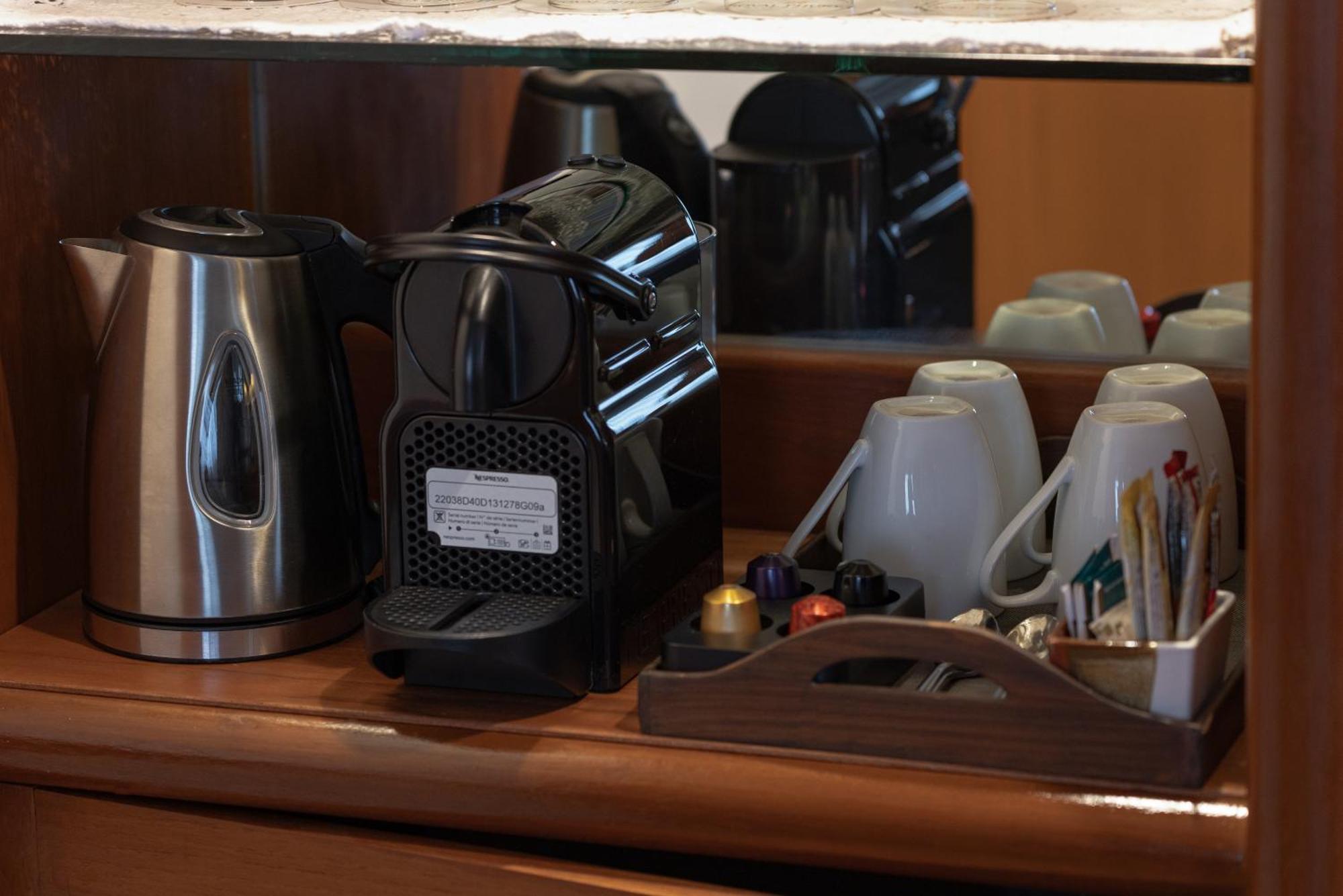 Royal Phuket City Hotel Εξωτερικό φωτογραφία A Nespresso coffee machine in a hotel room