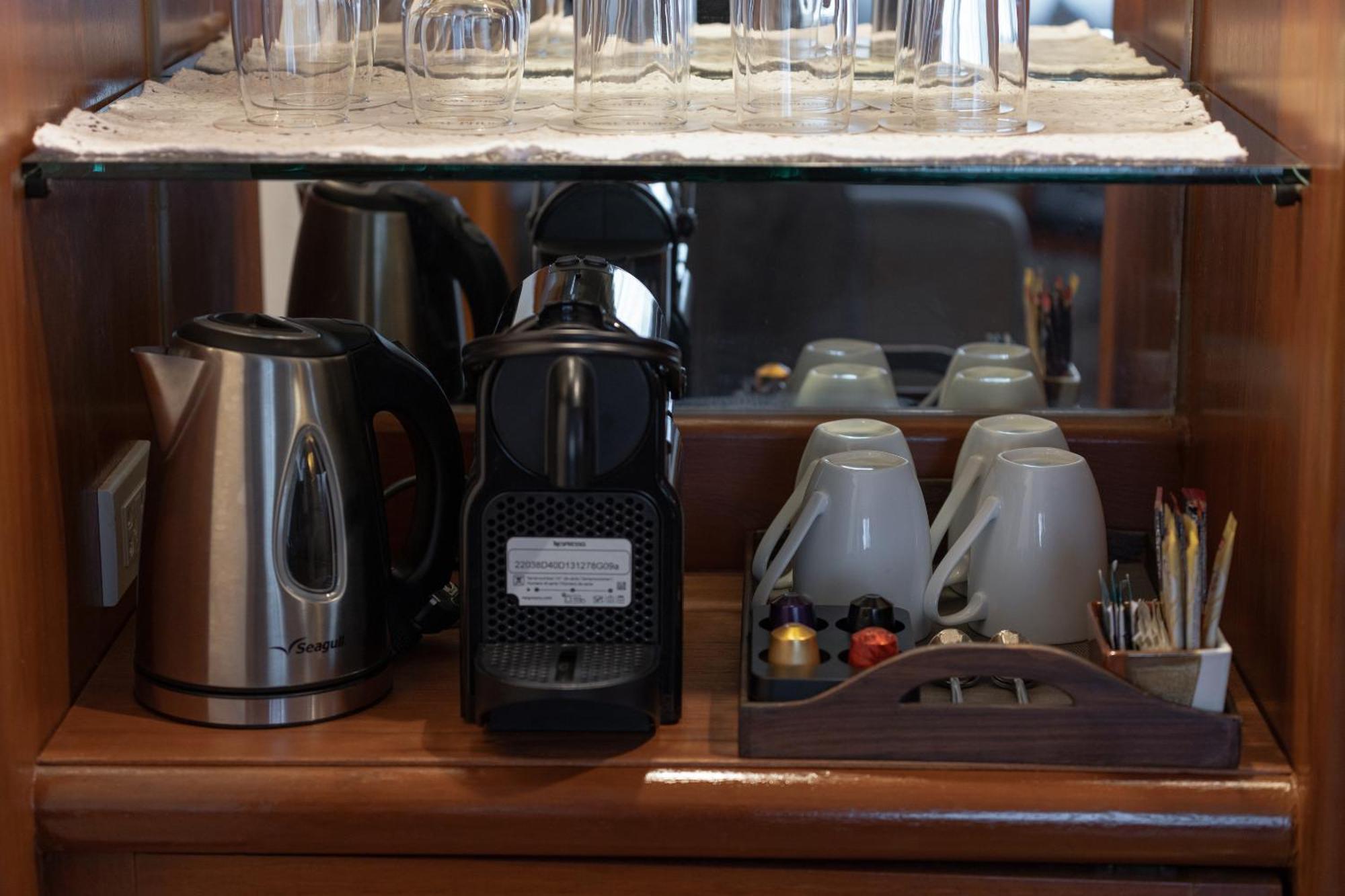 Royal Phuket City Hotel Εξωτερικό φωτογραφία A Nespresso machine in a hotel room